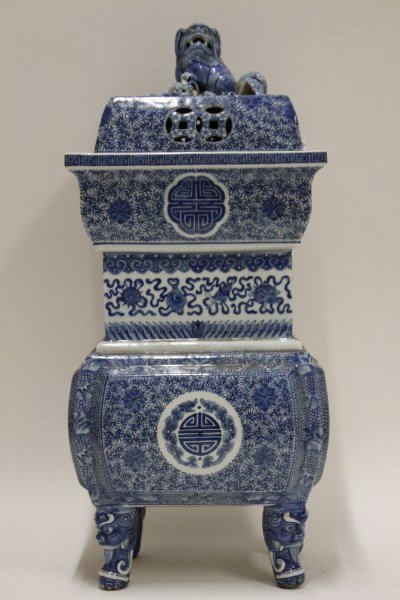 Large Chinese Qing Dynasty Cover Censor and Cover,: finely decorated with a eight symbols of the Buddhist, shou character roundels and bats, supported on four Buddhist lion head feet, the cover with Buddhist lion finial, h 49cm Provenance: A.G Bennett,