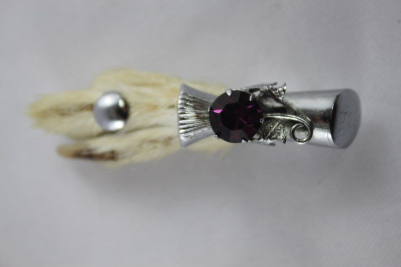 Rabbit's foot shop brooch