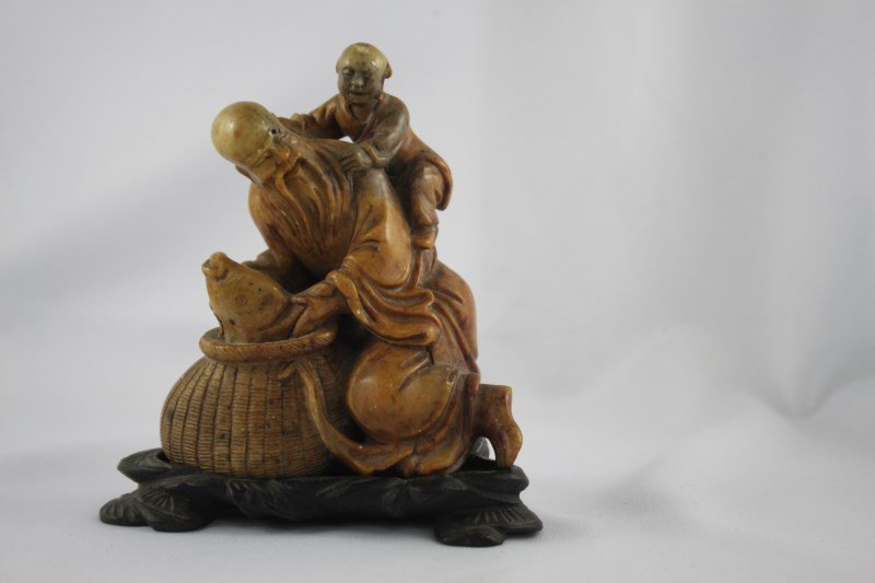 Two Chinese Carved Soapstone Figures,: h 8cm, h 12cm, (2) Provenance: Estate of the Late Dr Josef & Mrs Edith Peukert
