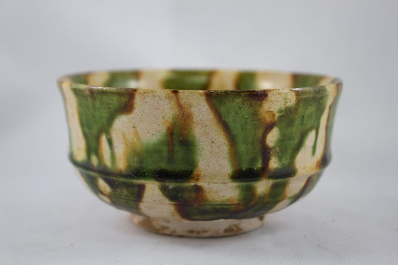 Chinese Sancai Glazed Bowl,: in typical palette of green, brown, and cream, d 11.5cm