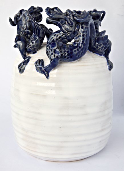 Unusual Chinese Porcelain Vase,: decorated with three rampant dragons to the rim, above a ribbed cylindrical body, incised and impressed marks to base, h 22cm Provenance: Private Collection of Dr. Chung,