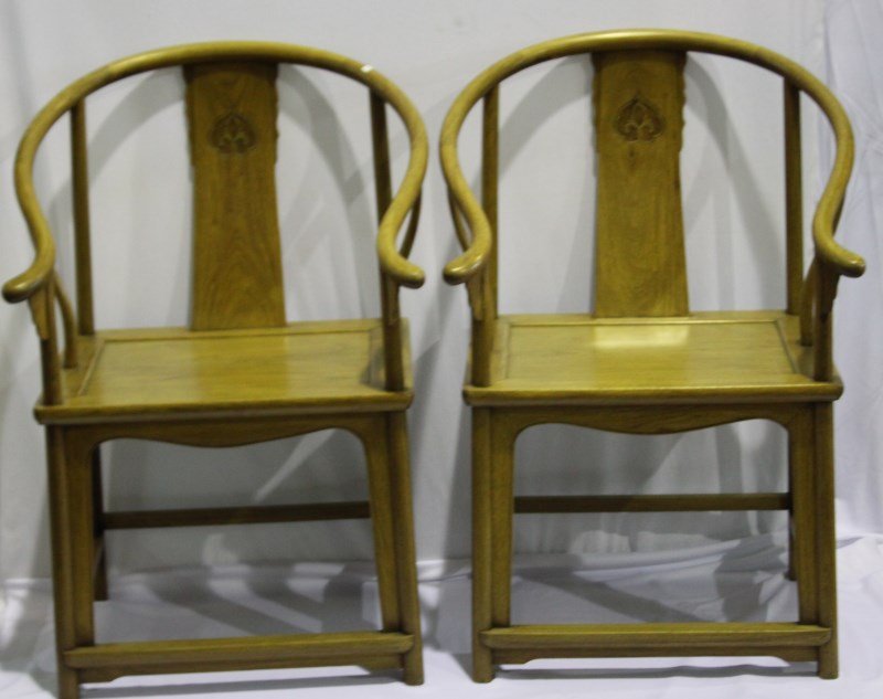 Pair of Chinese Horse Shoe Back Armchairs and: Tea Table, the chairs with curved backs and square seats, on four curved legs, with shaped brackets united by stretchers, (3)