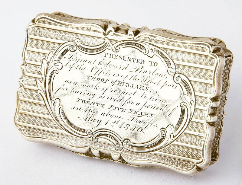 Victorian Sterling Silver 'Hussars' Presentation: Snuff Box, hallmarked Birmingham, 1845, W & E Turnpenny, shaped rectangular form, engine turned, gilt interior, with presentation inscription, "Presented to/Sergeant Edward Barlow/by the Officers of t