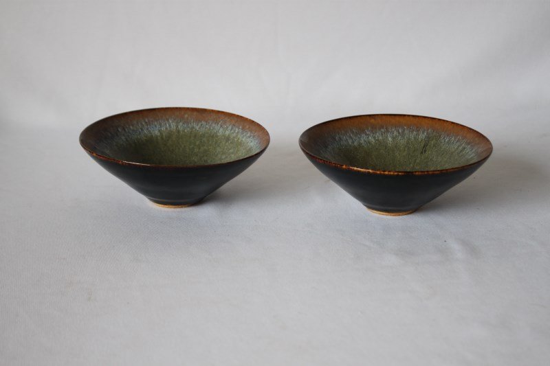 Pair of Chinese Hare Glaze Bowls,: of spreading conical form, in tones of brown to blue, d 16cm