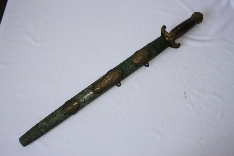 Chinese Qing Double Gian Sword and Scabbard,: set with twin swords, with cast ad incised mounts, with shagreen scabbard, l 63cm