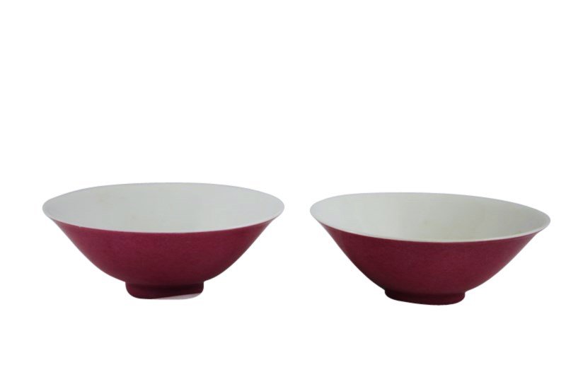 Pair Chinese Porcelain Bowls,: finely potted with everted rim on narrow foot, rouge red glazed exterior with lemon peel texture, white interior, one with small chip, Yung Cheng marks but later (probably late Qing), in fitted brocad