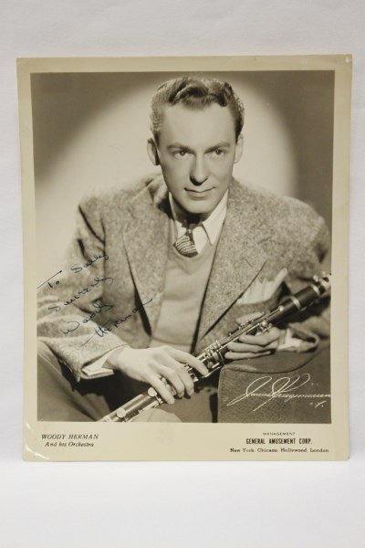Signed Photo, Woody Herman,: clarinetist and big band leader, original publicity portrait, inscribed, "To Sally/Sincerely/ Woody Herman". Some small pin holes to corners of the photo, 25.5cm x 20.5cm