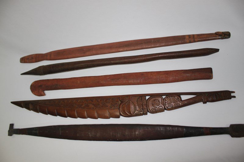 Quantity of Tribal Artifacts,: Three Woomeras, Pacific club and totemic carving. (5)