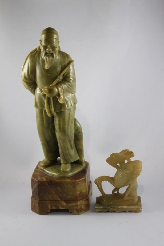 Chinese Carved Soapstone Figure,: depicting an elderly man holding pipe, on pedestal base, h 25cm, together with carved soapstone figure of crane (2)