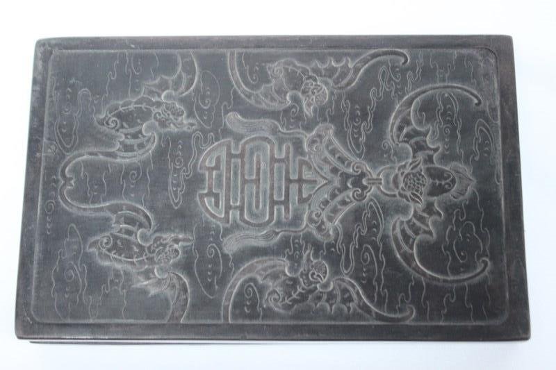 Chinese Carved Inkstone and Cover,: of rectangular form, carved with wu-fu, surrounded a sho motif, opening to interior well, 23cm x24cm
