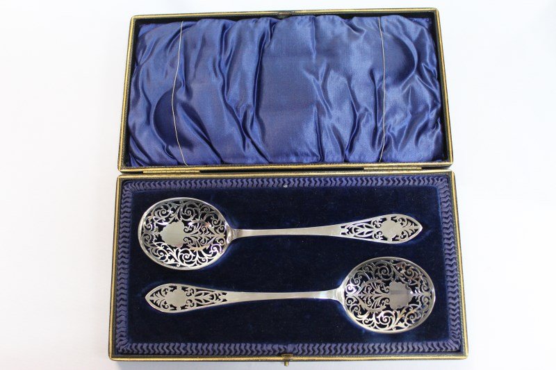 Pair of Edwardian Sterling Silver Berry Spoons,: hallmarked Sheffield, 1902, Roberts & Belk Ltd both spoons with fine pierced scrolling decoration to bowl and handle terminal, total weight 101gms