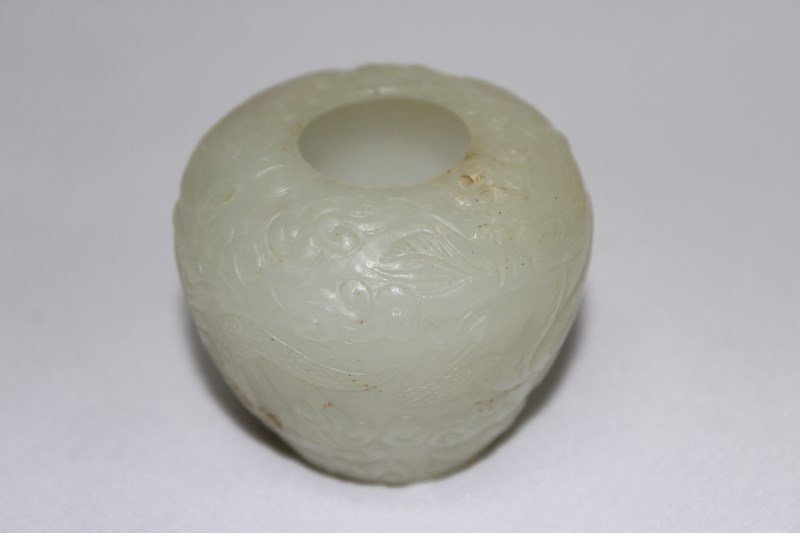 Chinese Jade Scholars Brush Washer,: of tapering ovoid form, carved with a rampant dragon within a cloud scroll, h 5cm