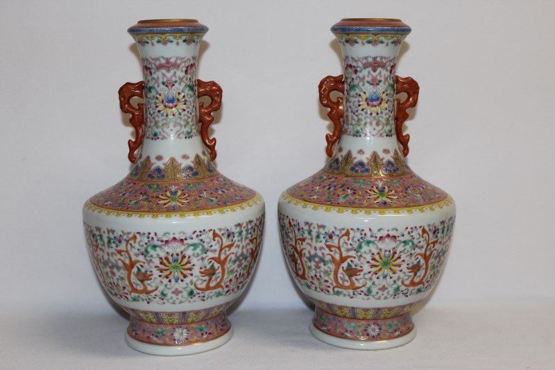 Lovely Pair of Chinese Porcelain Vases,: with onion shaped necks, and tapering bodies, all over decorated with peony scroll and dragons, in rich enamel tones of orange, green, pink and yellow, underglaze seal mark to base, h 28cm (2)