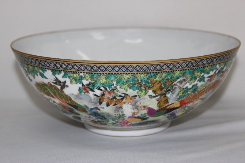 Fine Chinese Egg Shell Porcelain Bowl,: of circular form, decorated with a wonderful scene of various birds amongst flowers and in flight in rich tones of pink, green, yellow and brown, on circular foot, four character mark to foot, d 20.5c