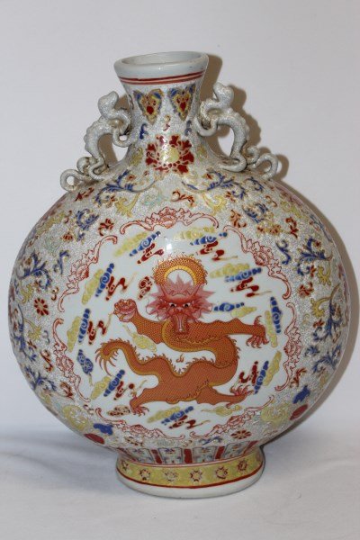 Chinese Porcelain Moon Flask,: decorated with with reserves of dragons and royal pearls, surrounded by cloud scrolls and peony on a crackle ground, on oval foot, seal marks to base, h 41cm