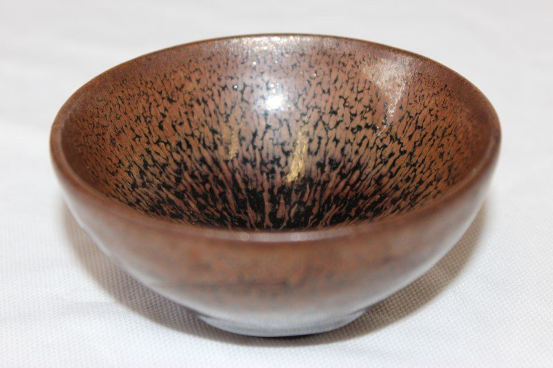 Chinese Hair Glazed Bowl,: of circular tapering form, in tones of brown and black, on unglazed foot, d 9.3cm