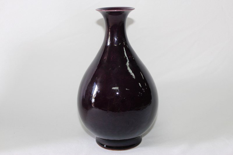Stunning Chinese Porcelain Vase,: of baluster form, with flared lip, the body faintly decorated with dragon and palmette motif, on circular foot, impressed mark to foot, h 22cm