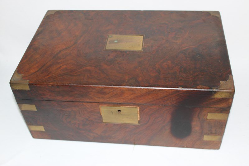 Large Victorian Walnut Writing Box,: of deep rectangular form, with strap work to the corners, opening to a fitted interior with a tooled leather writing slope and twin inkwells, 17cm x 40cm x 25cm