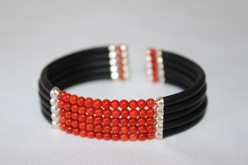 Red Coral Bead Bangle,: with black flexible band,