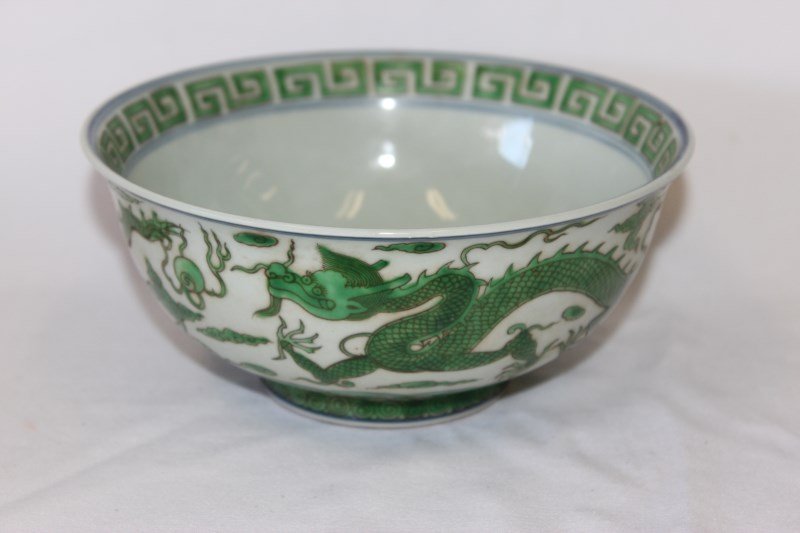 Chinese Porcelain Bowl,: with single Dragon and meander pattern to interior, the exterior with two Dragons chasing pearls, six character mark to base, d 18cm, h 8cm