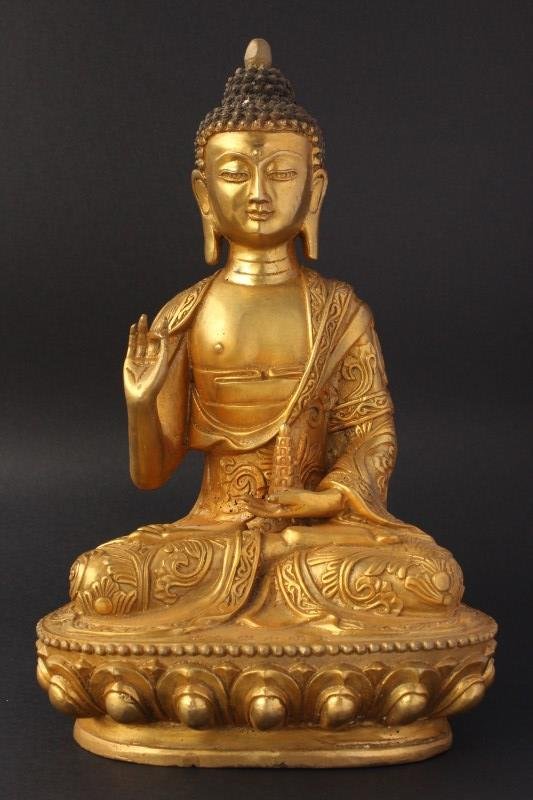 Sino Tibetan Gilt Bronze Figure of Buddha,: depicted seated with one hand raised, the other holding vessel, legs crossed on lotus base, six character mark to base, h 18cm