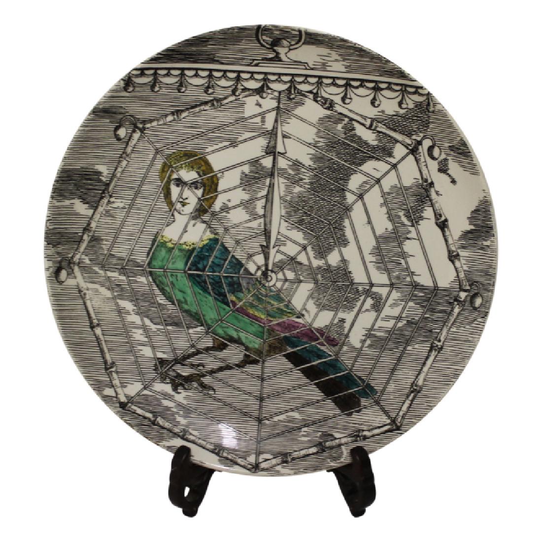 Fornasetti Plate: Le Arpie Gentili: Le Arpie Gentili Fornasetti Plate. Measure 10" in diameter. Very Good Condition.