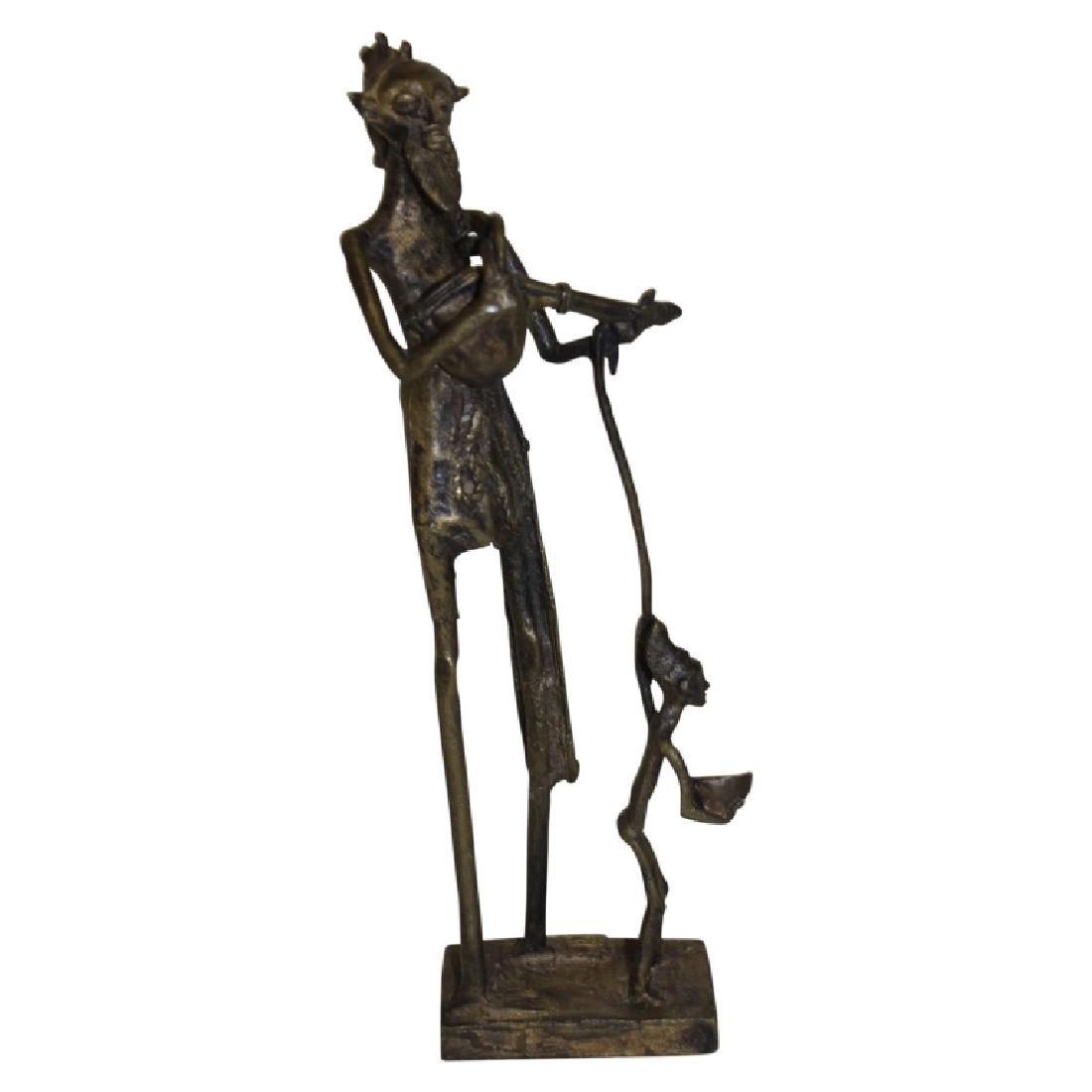 Antique Bronze African Figure: Bronze, antique African figure of a man. Measures 14" High. Very Good Condition.