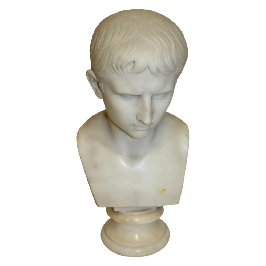 Italian Marble Bust: Bust of a young boy made of marble. Italian. Circa 19th Century. Cesar Capp. Measures 17" High and 7.75" Wide.
