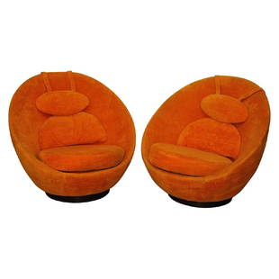 2 Milo Baughman for Thayer Coggin Swival Chairs: Set of 2 Mid Century Modern Milo Baughman for Thayer Coggin large scale egg shaped, swival chairs with headrest. Rotates 360 degrees with a wood laminent base. Orange in color. USA origins. Circa 1972