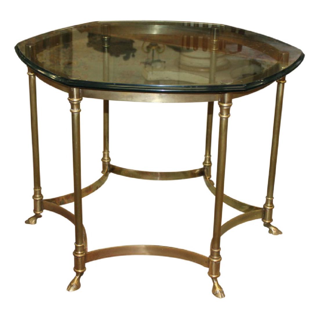 La Barge Hexagonal Cocktail Table: Mid Century Modern/Hollywood Regency cocktail table by La Barge. This piece is shaped in the form of a hexagon and features hoof feet with a green edged beveled glass top. Measures approximately 22" H