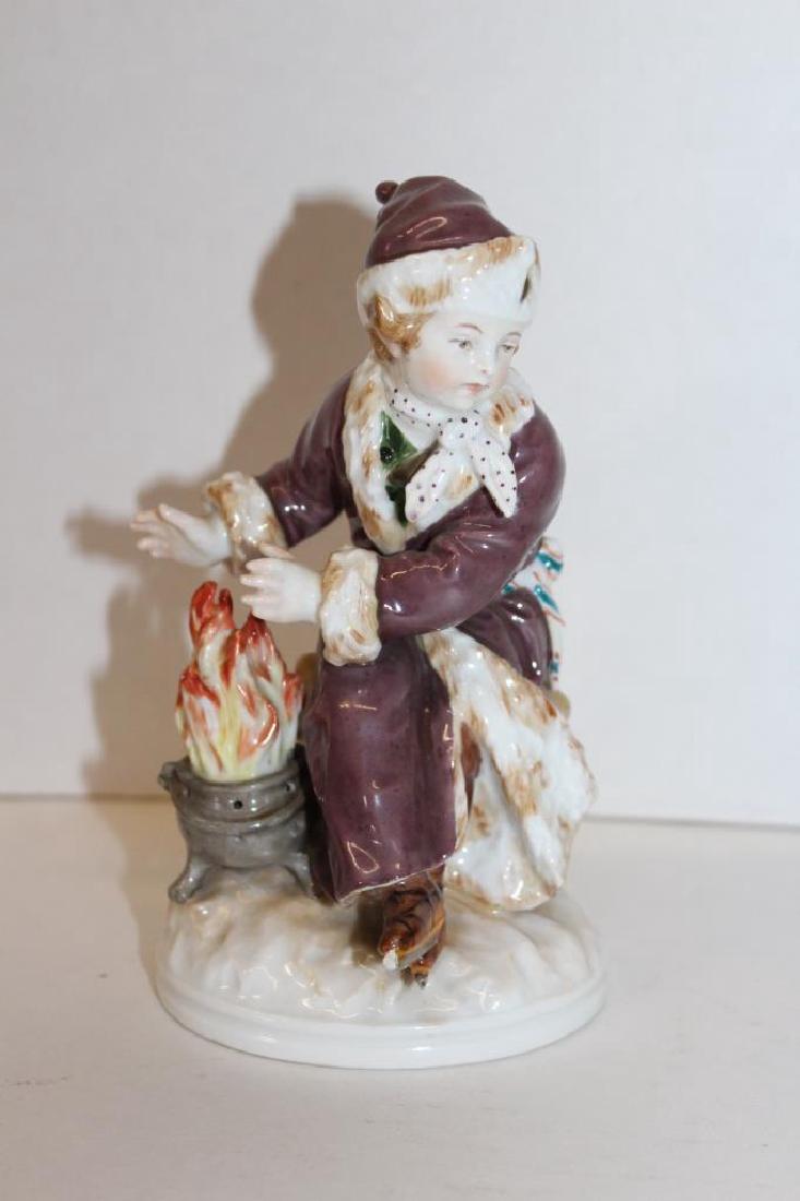 Rare KPM Fire Figure: Rare figure by KPM. This piece depicts a figure standing next to a fire. Marked and numbered (#104/353) on the bottom on the piece. Hand painted and made of porcelain. Measures approximately 6.25" Hig