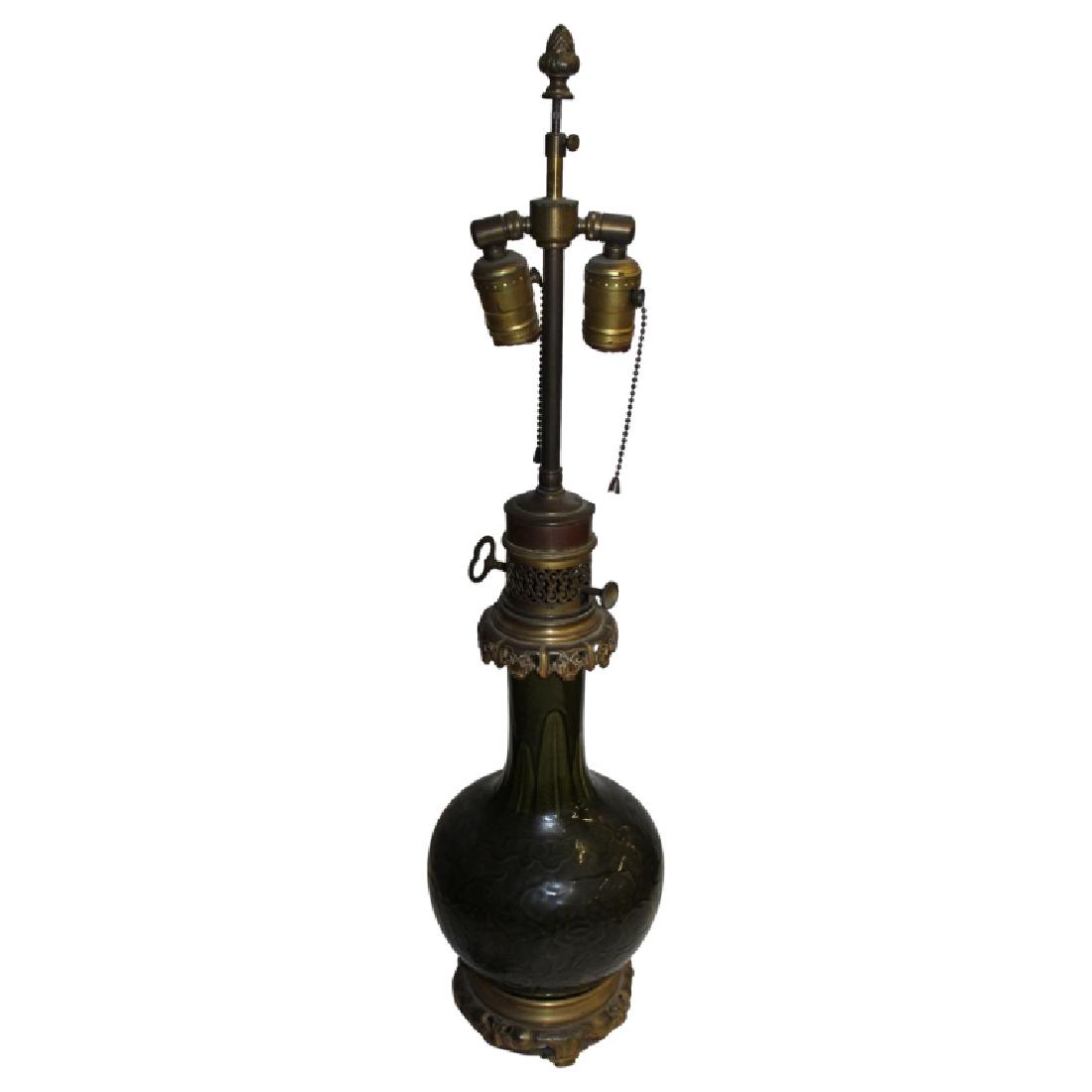 Asian Floral Motif Vase Light Fixture: Asian, antique vase featuring floral, foliage motifs fitted into a light fixture. Good condition.