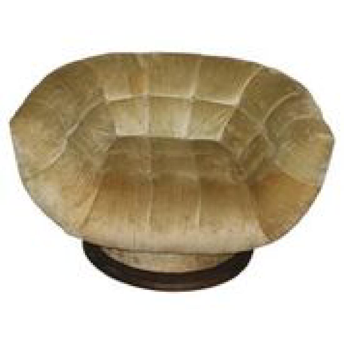In The Manner of Vladimir Kagan Swivel Chair: Attributed to Vladimir Kagan swivel chair with flared arms and wood swivel base. Size 43 wide from flare to flare, 35" deep, 27" high with a 20 wide by 23 deep seat. Weighing about 30 pounds.