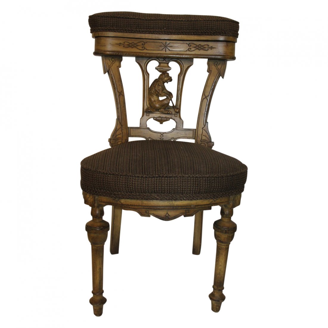 Butler Chair with Carved Dog Crest: Butler chair with Carved Dog Crest Measuring: 35 inches high x 20 inches wide x 18 inches deep