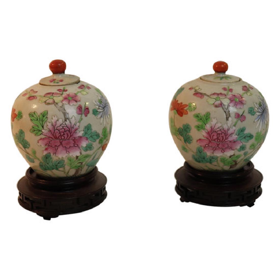 Pair of Chinese Small Covered Porcelain Vases: A pair of Chinese small covered porcelain vase on stands. Measuring 3 1/2 inches by 3 inches. From a fine Haddonfield New Jersey