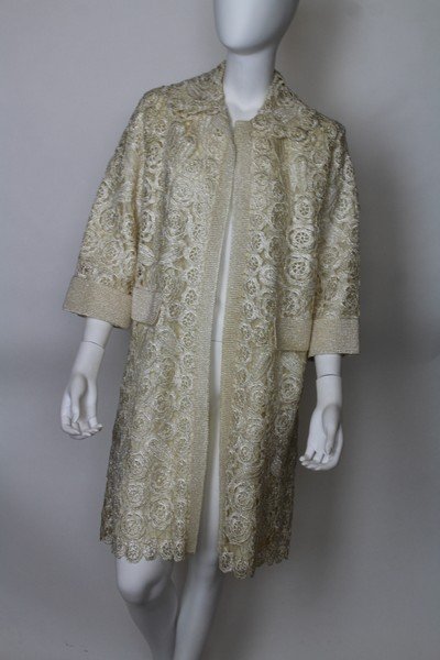 Cream Duster by Tina Mozzoli Firenze: Vintage cream duster with embroidered applique on cream background. Size 8-12