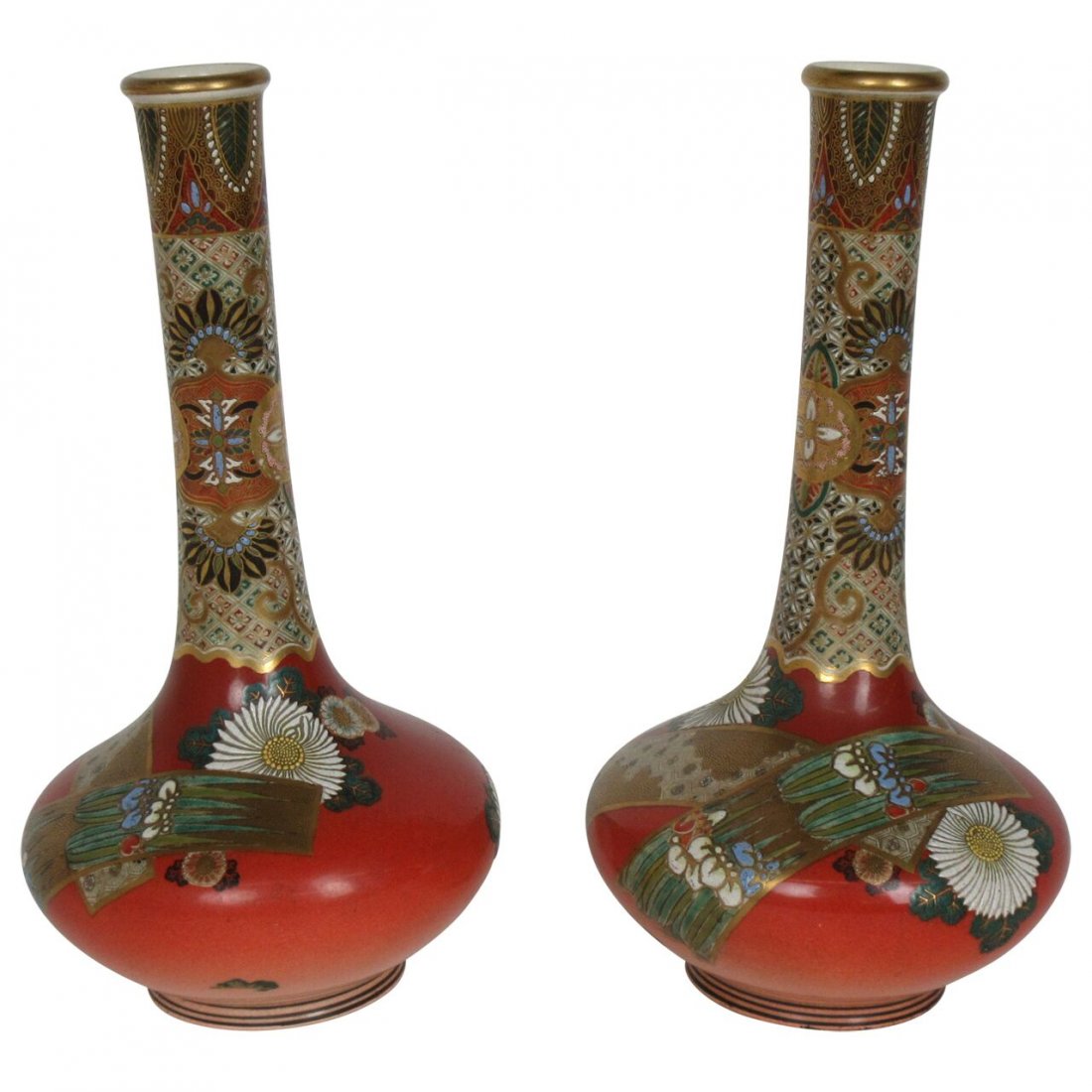 Pair of Japanese Satsuma Meiji Vases: Pair of Japanese Meiji period Satsuma Vases in decorated with patterns and gilt with an orange background. Measuring 9.5 x 5.5 inches.