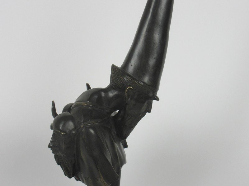 BRONZE SCULPTURE SIGNED RAFAEL CORONEL: Rafael Coronal: October 24, 1931 to May 7, 2019, Mexican.Bronze wizard Wizard (Mago) with animal head on the back of the wizard / monka finished in a dark brown patina almost black. Sculpture measures