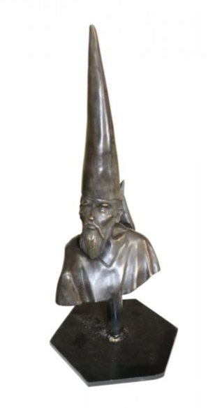 BRONZE SCULPTURE SIGNED RAFAEL CORONEL: Rafael Coronal: October 24, 1931 to May 7, 2019, MexicanBronze sculpture on a Wizard (Mago) finished in a dark brown patina having another wizard on his back. Sculpture measures 19 inches by 6 1/2 inc