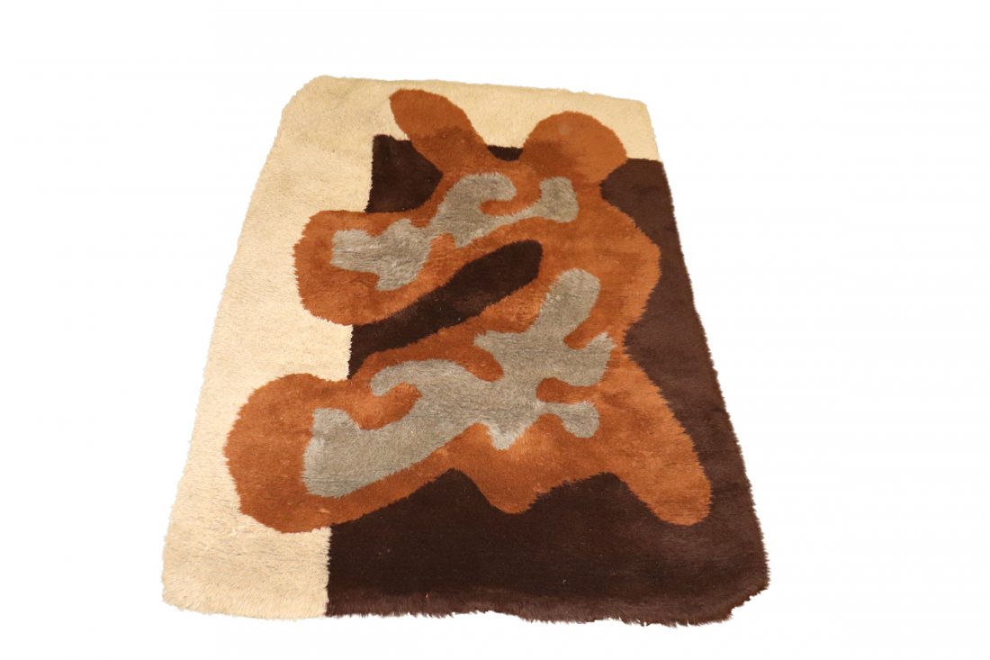 VINTAGE EGE RYA SHAG RUG: Vintage mid century Ege Rya shag rug with an Alexander Calder design. Measures 5 feet by 7 feet 6 inches. Good frontal appearance with an some old repairs to back.