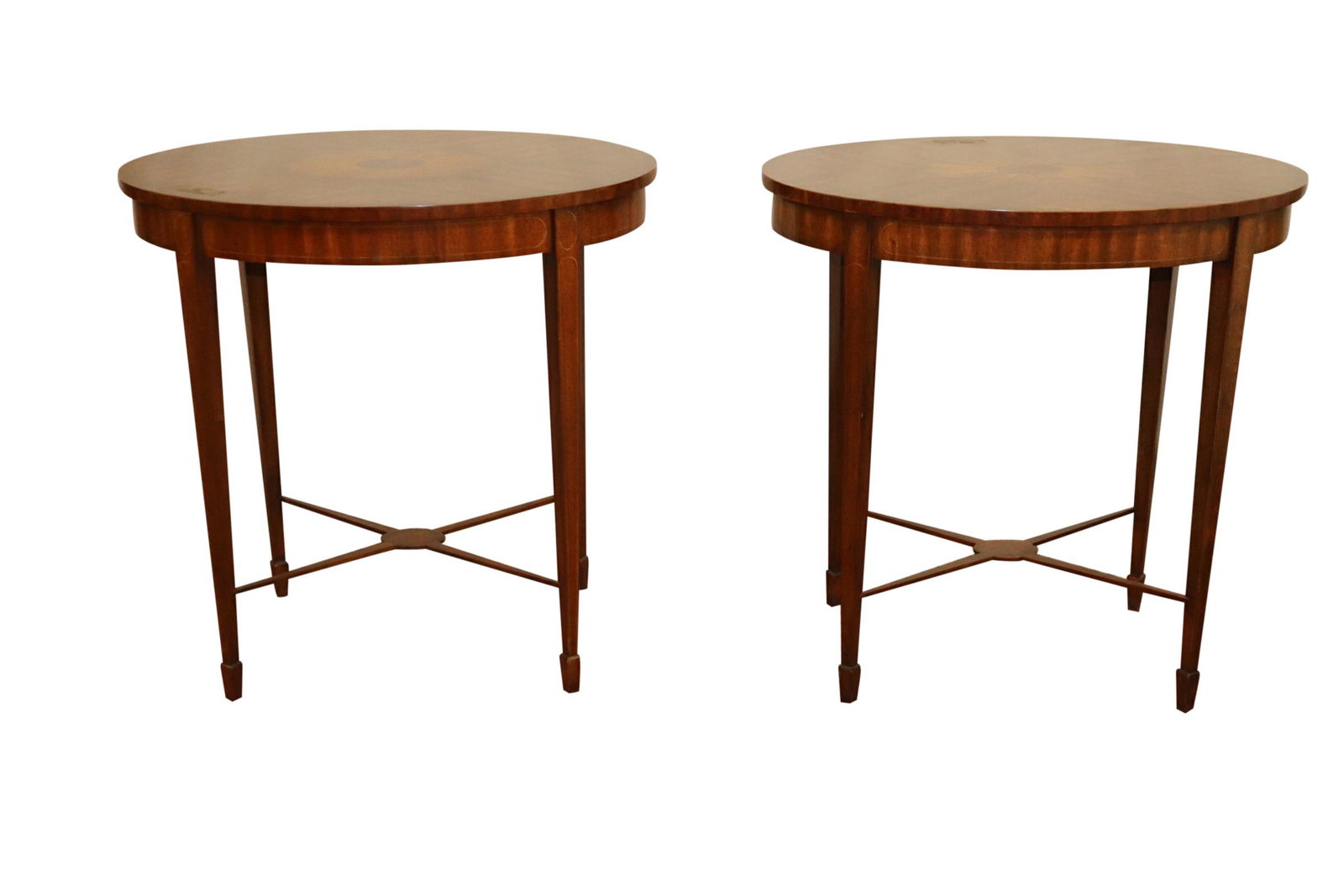 PAIR OF FINE MAITLAND SMITH INLAID END TABLES: A fine pair of oval Maitland Smith demunitive side or occastional tables with fine detail and inlay. Each measures 17 inches deep by 24 inches wide and 24 inches tall. Good condition.