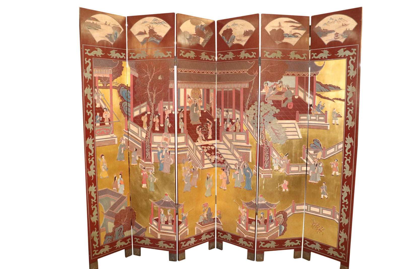 VINTAGE CHINESE RED AND GILT FOLDING SCREEN: A large Chinese vintage folding screen with gilt decoration on a brick red backgound. Measuring 90.5 inches tall by 108 inches wide. Good condition.
