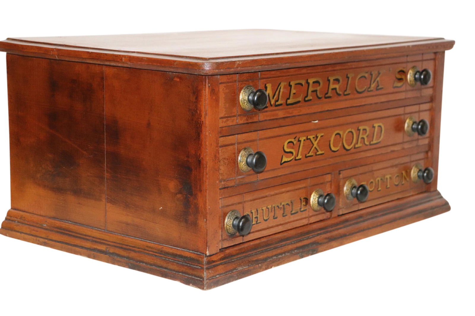 ANTIQUE AMERICAN MERRICK SPOOL CABINET: Antique American walnut three drawer spool cabinet by Merrick. Measuring 22 inches wide by 15 inches deep and 10.5 inches tall. (Note: Mate to the previous lot) Good condition.