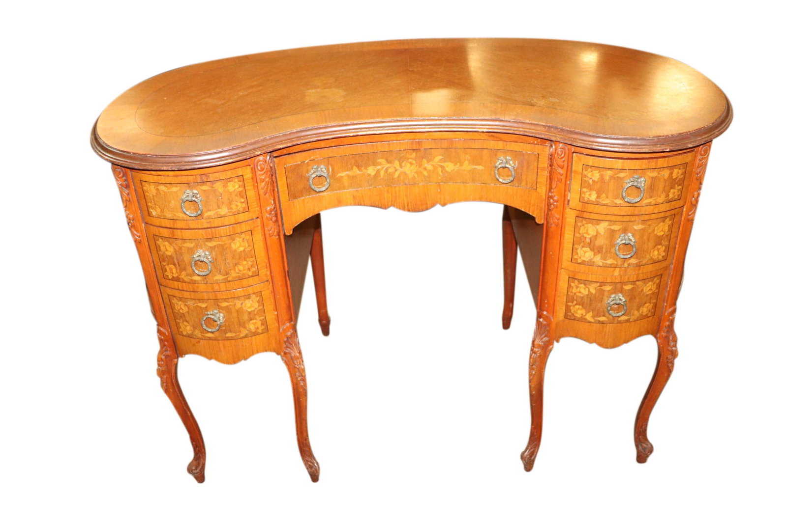 1920: Exquisite antique French inlaid vanity desk measuring 43 incjes wide by 21 inches deep and 30.5 inches tall. Good condition