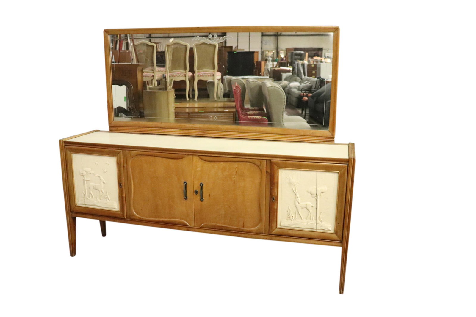 STUNNING ITALIAN ART DECO PERIOD BUREAU: Stunning large Italian art deco bureau with mirror and carved door panels depicting antelopes. Measuring 85.5 inches wide by 73 inches tall and 20 inches deep. Splits to door panels.