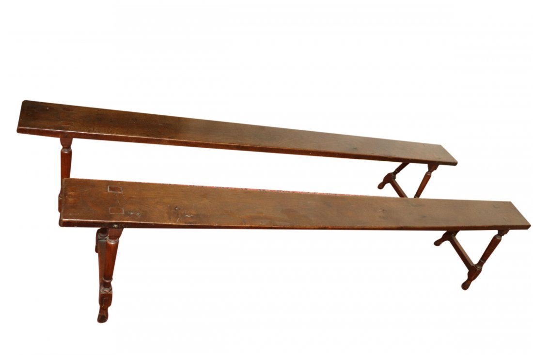 PAIR OF LONG RUSTIC BENCHES: Pair of long rustic benches with turned splayed legs and plank seat. Measuring 86.5 inches long by 18 inches tall with a 7 inch plank and a 13.5 inch wide leg splay. Good condition. These benches were