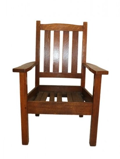 STICKLEY BROTHERS ANTIQUE ARM CHAIR: Stickley Brothers antique mission oak arm chair in golden oak with the Stickley label and branding. The chair measures: 39.5 inches tall by 28 inches wide from arm to arm, 24 inches deep and 15 inches