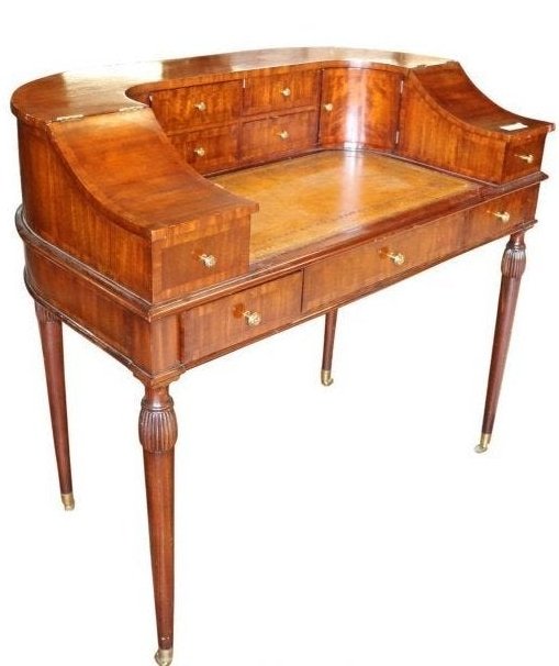 Leather Top Carlton House Desk by Maitland Smith: 20th Century Leather Top Style Carlton Desk with a paper label stating: "Handmade in the Philippines Designed By Maitland Smith". Measuring: 38 inches tall x 42 inches wide x 25 inches deep. Good cond