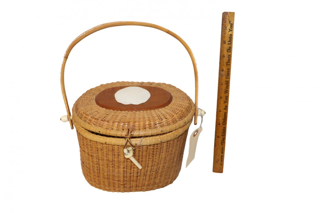 R.L. Webber Nantucket Seashell Lidded Basket: R.L. Webber Nantucket Seashell Motif Lid Latch Handled Basket 8" Diameter 12.5 inches Total Height with handle up position. Good condition. Bone closure needs attention please see photos. Over good co