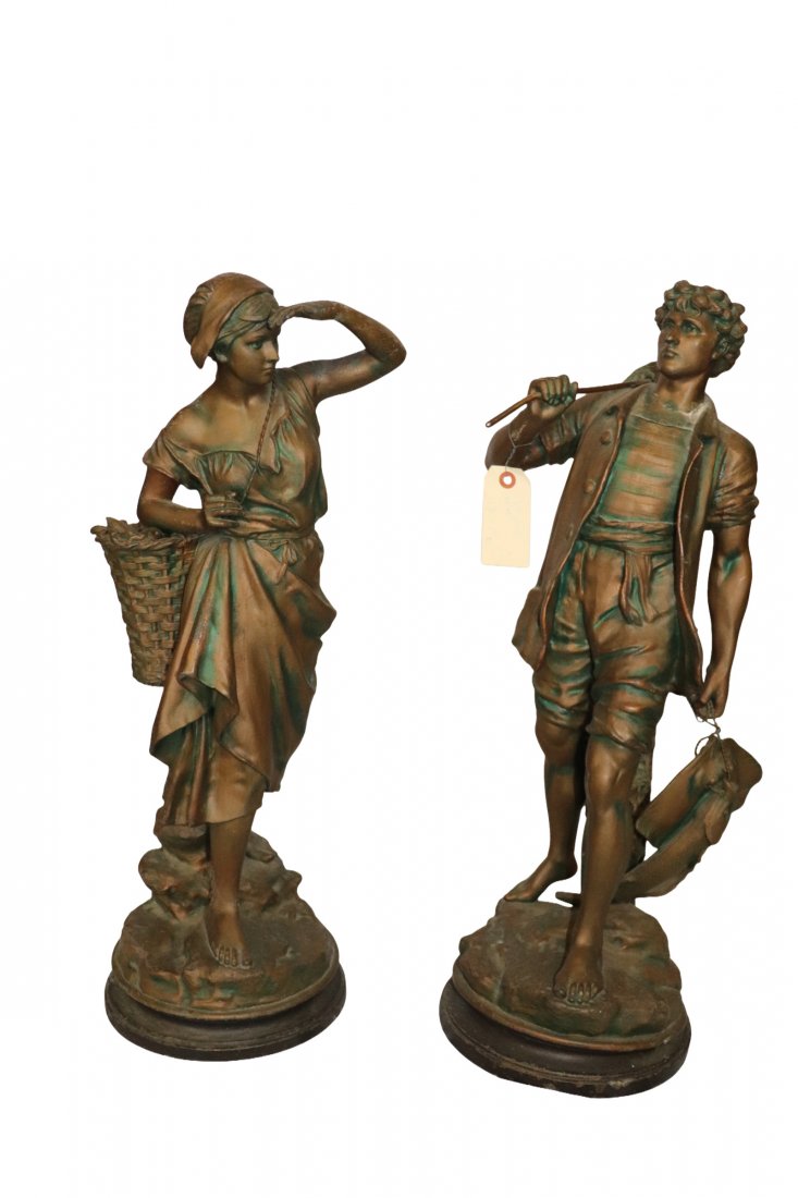 Tall pair of Peasant Metal Statues: Pair of Tall Peasant Metal Statues. Man has cracked at the neck. Please refer to photos for more detail. Woman is with a basket. Overall 26x9 inches. Fair conditionPlease refer to photos for details